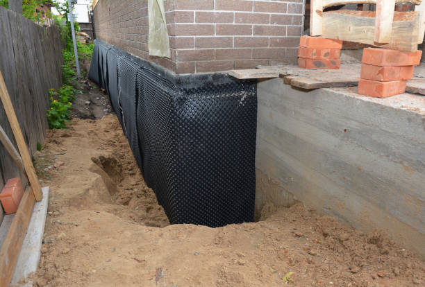 SJ Waterproofing Pros technician performing targeted Waterproofing assessment in Fairwater, WI